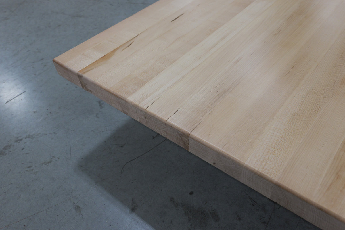 Open seams on the end grain near the corner