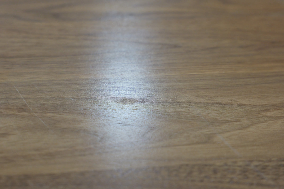 Small dent and light scratches in the middle